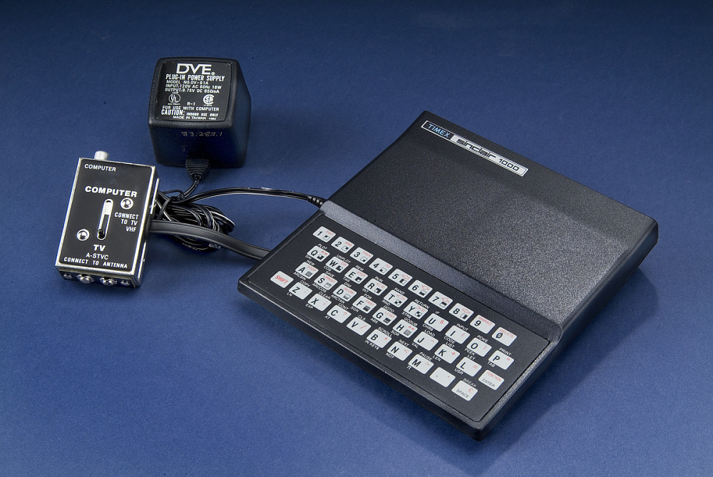 The Timex Sinclair 1000 computer, black calculator like slab with membrane keys