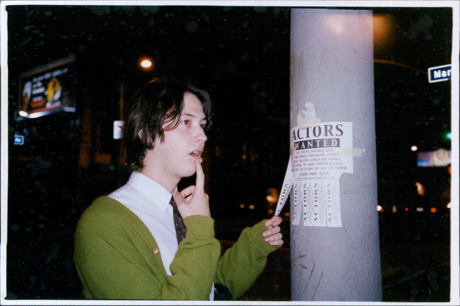 Me as a young man naively pulling a phone number off a posted bill reading Actors Wanted